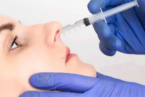 Non-surgical nose job treatment at The National Skin Centre, South Delhi -safe and effective nose reshaping without surgery